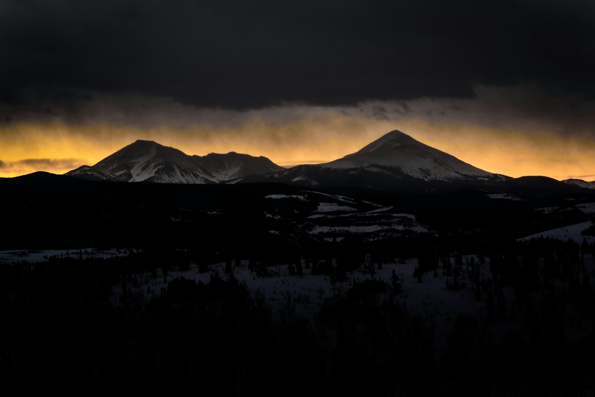 by Nathan Anderson - [Source](https://unsplash.com/photos/mountains-during-sunset-mKA3VavSuaI)